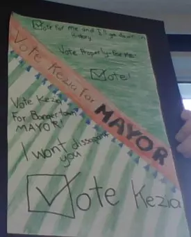 image of a poster created by a child designed to imitate a voting flyer. the flyer says to vote kezia for mayor