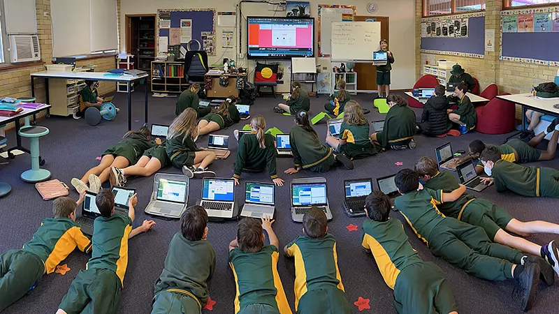 bradleys students on the mat using banqer in the classroom